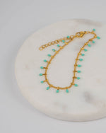 Wasserfestes Armband Mizu aus 18K vergoldetem Edelstahl mit türkisen Emaille-Elementen 