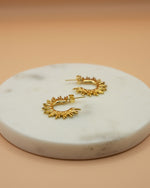 Wasserfester Gold Ohrring mit Sonnnenstrahlen 